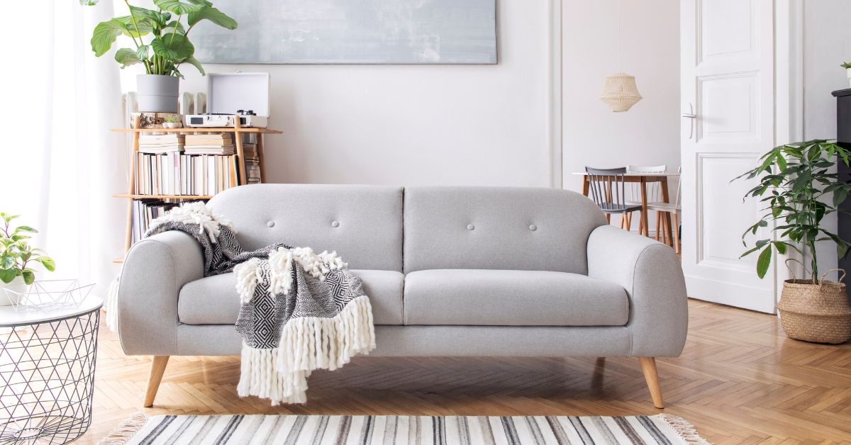 By the window, wooden living Room table with 6 chairs around